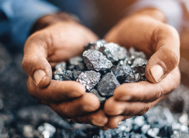 Stanislav_Kondrashov_Telf_ag_hands_holding_minerals_2.