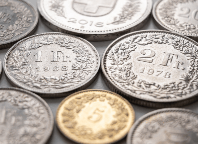 Gold coins representing value and currency comparison