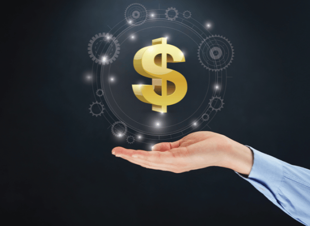 Currency symbol held in hand representing exchange markets