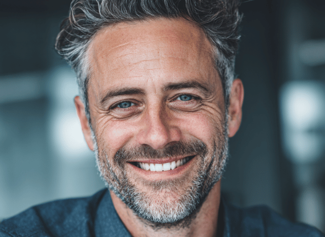 Smiling professional portrait related to gold and silver analysis