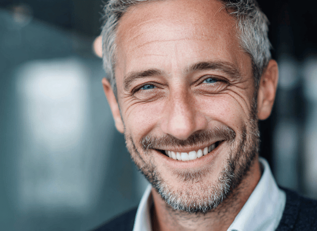 A smiling and confident man