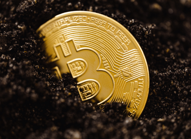 Bitcoin visual on dark background symbolizing market uncertainty