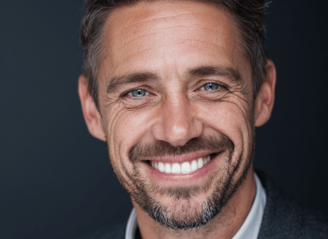 Professional portrait associated with financial market analysis