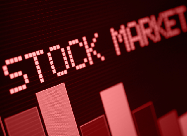 Stock market trading screens representing Nasdaq, S&P 500, DAX and SMI activity