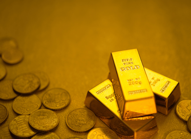 Gold coins representing current gold price trends and precious metals markets