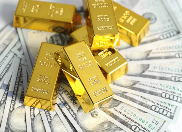 Banknotes and gold illustrating the relationship between currency and precious metals