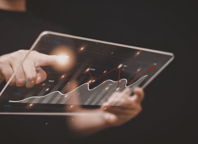 Tablet displaying financial data related to Swiss insurance, pharma and industrial stocks