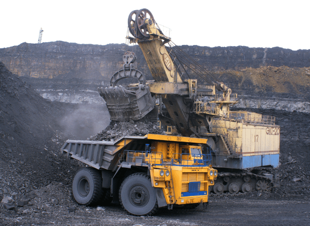 Large-scale mining machinery operating at a mineral extraction site, illustrating the resources that support Pax Silica and the global AI technology supply chain.